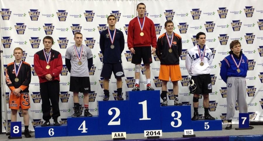 Podium shot of the top 8 152 lb place winners in the 2014 PIAA AAA Championships.