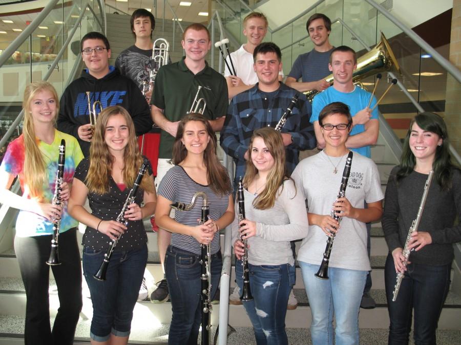 Honors Band students pose with their instruments.