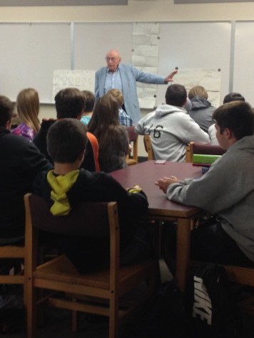 Mr. Bill Hosking, World War II veteran, speaks to students and staff about his experiences during and after the war.