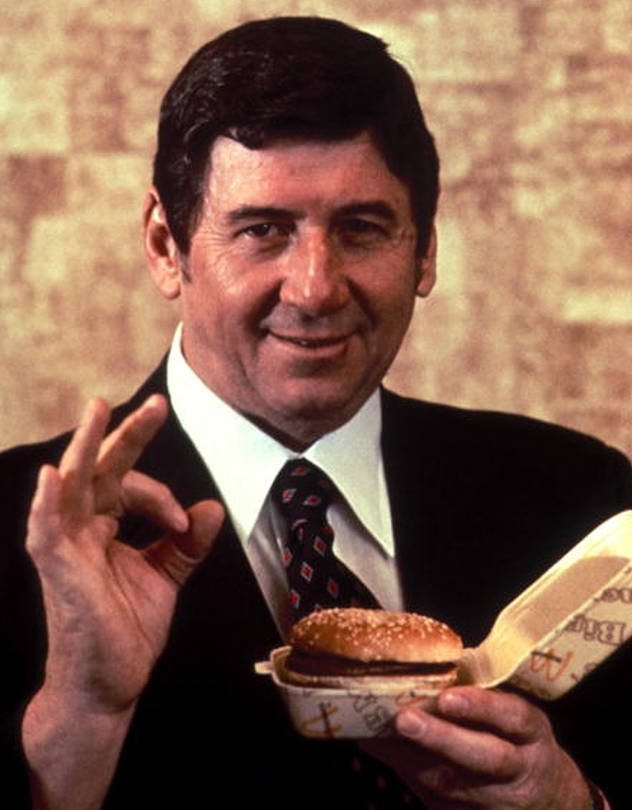 Jim Delligatti holding his iconic burger. 
