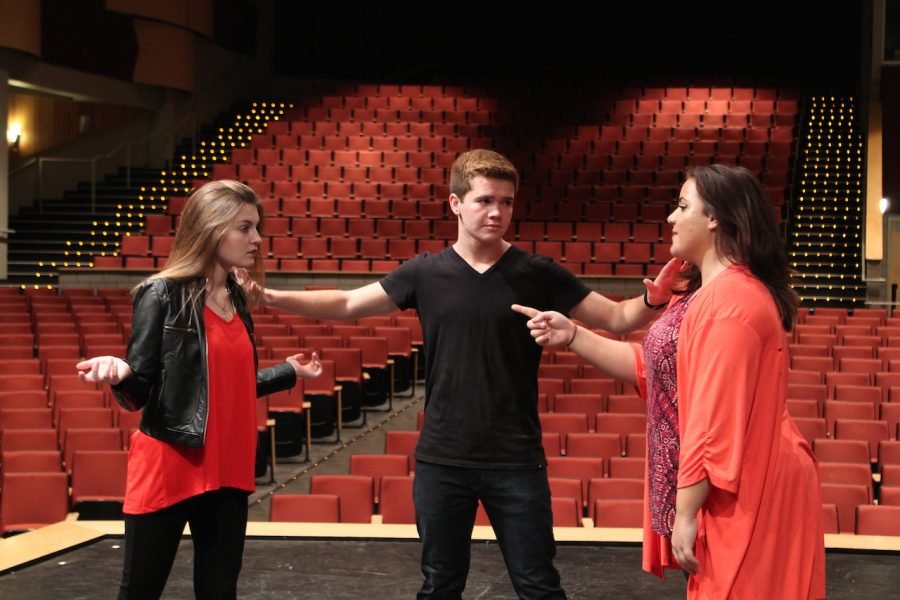 Michael (Greydon Tomkowitz) settles a dispute between Kate (Alexandria Zallo) and Mattie (Chelsea Hallman) in this years Fall Play Second Star.