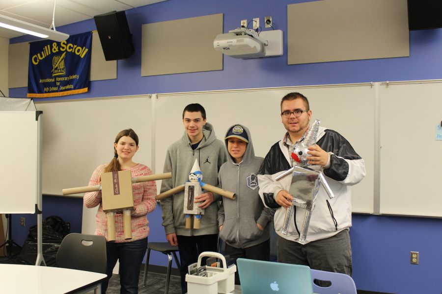 Mr. Zehnders geometry students show off their tin men.
