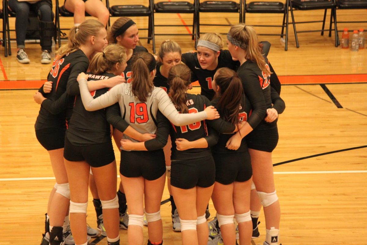 The Lady Hawks huddle up during their game against Mt. Lebo on Tuesday, Sept. 19. Photo by: Maria Cerro