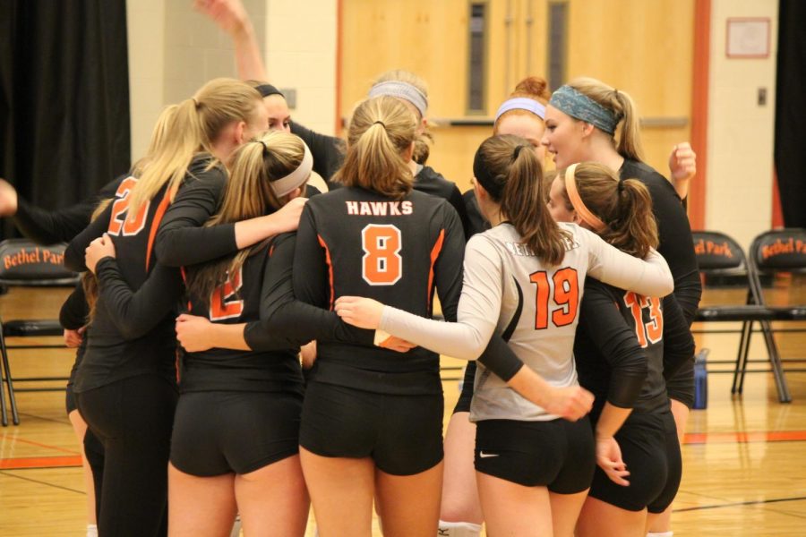 Lady Hawks huddle up during their game against Penn Trafford on Sept. 7. Photo by: Maria Cerro
