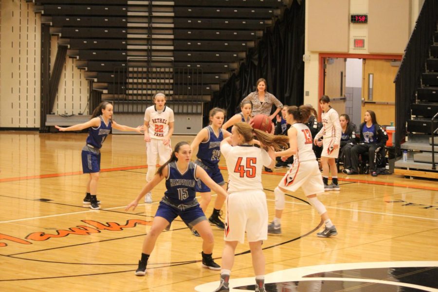 Lady Hawks look to make a play against Hempfield during their first game of the Tip-Off Tournament Friday, Dec. 8.