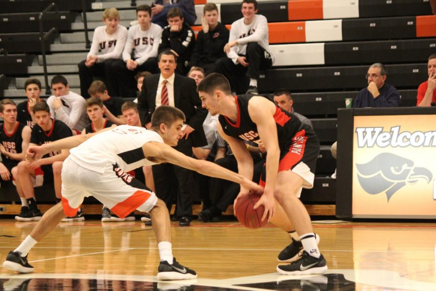 Justin Meis reaches for the ball during the Hawks game against the Panthers on Tuesday, Jan. 23