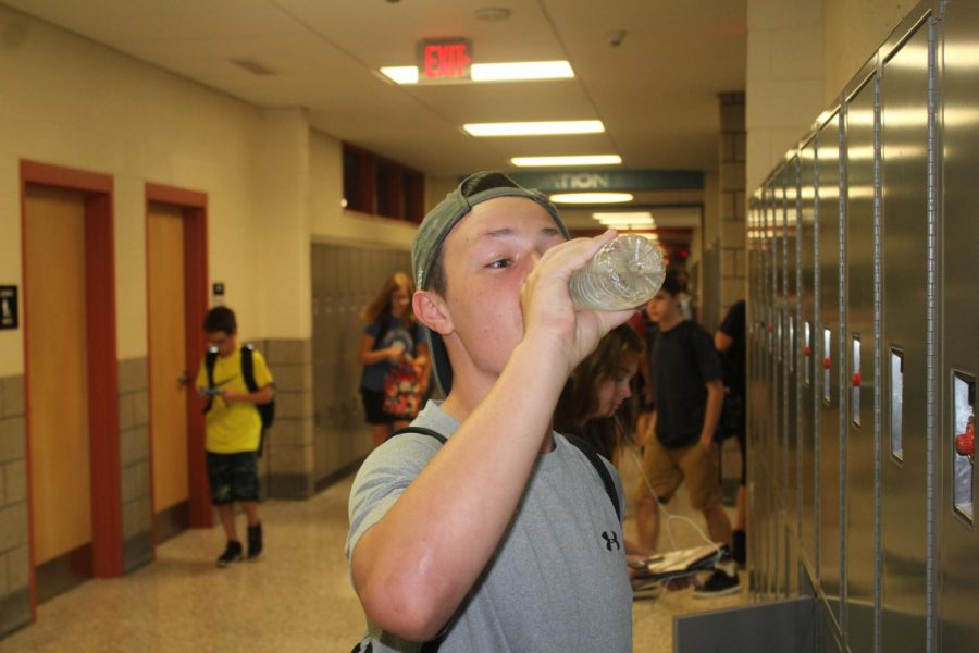 Sophomore Darren Getty takes a sip of water in between classes on Tuesday, Sept. 4.