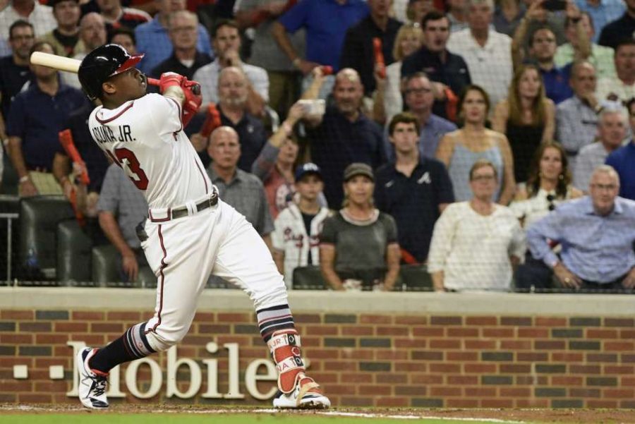 Atlanta+Braves+left+fielder+Ronald+Acuna+Jr.+%2813%29+hits+a+grand-slam+homer+against+Los+Angeles+Dodgers+starting+pitcher+Walker+Buehler+during+the+second+inning+in+Game+3+of+MLB+baseballs+National+League+Division+Series%2C+Sunday%2C+Oct.+7%2C+2018%2C+in+Atlanta.