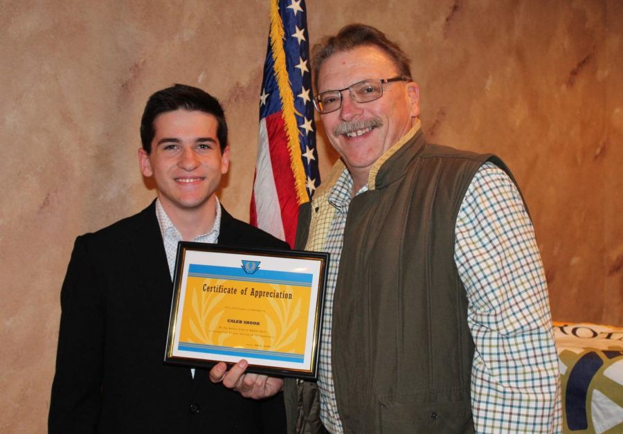 Junior Caleb Shook receives his October Rotary Student of the Month award.