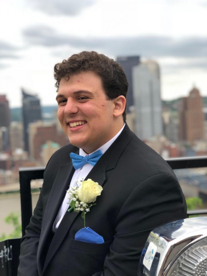 CHEESIN ON MOUNT WASHINGTON, Ben Hultz smiles for the camera before the 2018 prom.