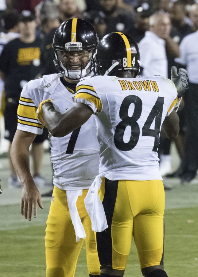 Quarterback Ben Roethlisberger of the Pittsburgh Steelers celebrates with teammate wide receiver Antonio Brown during a game against the Washington Redskins at FedExField on September 12, 2016 in Landover, Maryland.