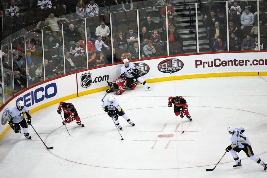Penguins #58 Kris Letang takes a breather on Devils #20 Jay Pandolfo