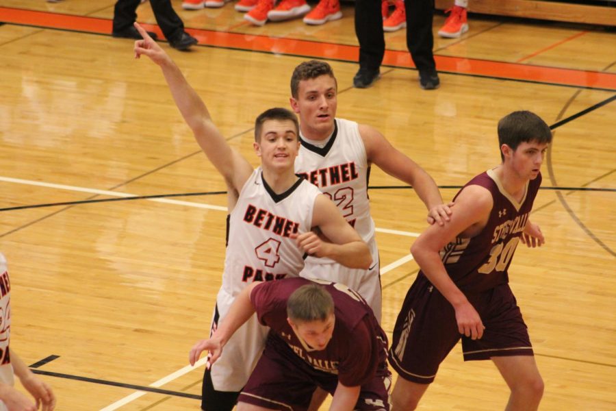 Junior guard Ryan Meis points to the basket during the Hawks game vs. Steel Valley on Friday, Dec. 7.