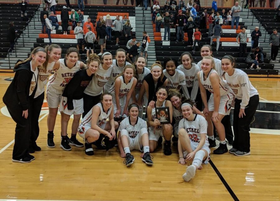 Lady Hawks are all smiles after defeating South Fayette in the championship game of the Bethel Park Holiday Tournament.