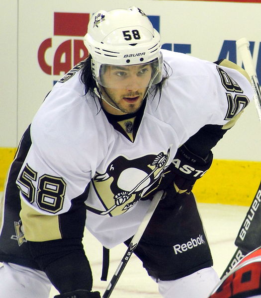 Pittsburgh Penguins defenseman Kris Letang awaits the faceoff during a November 12, 2011 game against the Carolina Hurricanes at RBC Center in Raleigh, NC.