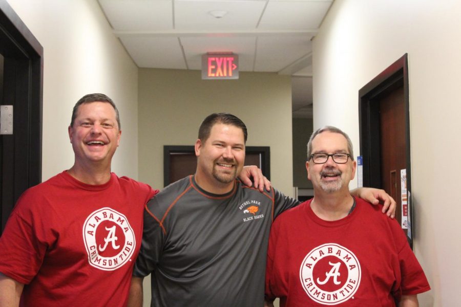Mr. Knapp (far right), poses with Mr. Bruce (far left), and Mr. Jones (middle).