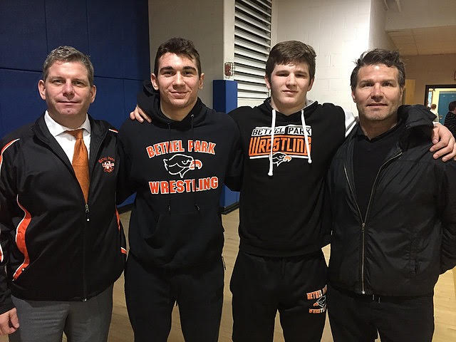 Coach Tim Crawford, Luke Montgomery, Riley OMara, and Coach Mark Eckley pose for a picture at the 2019 WPIAL Championships