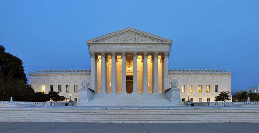 Panorama of the west facade of United States Supreme Court Building at dusk in Washington, D.C., USA.