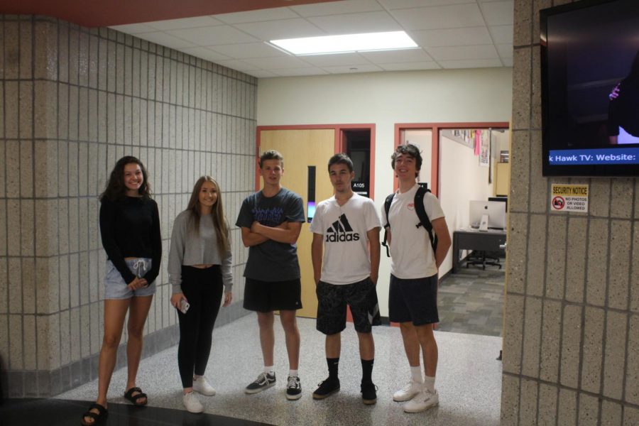 Students pose for a pic on Black and White Day during Homecoming Week.