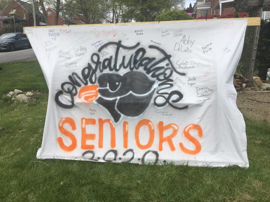 Seniors 2020 poster displaying many senior signatures outside the Tarrs house.