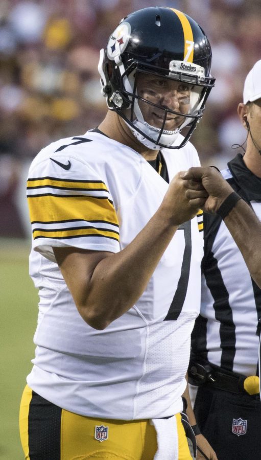 Steelers QB Ben Roethlisberger gets acknowledgement from his coach as he comes off the field during the Steelers game vs the (then) Redskins on Sept. 12, 2016.