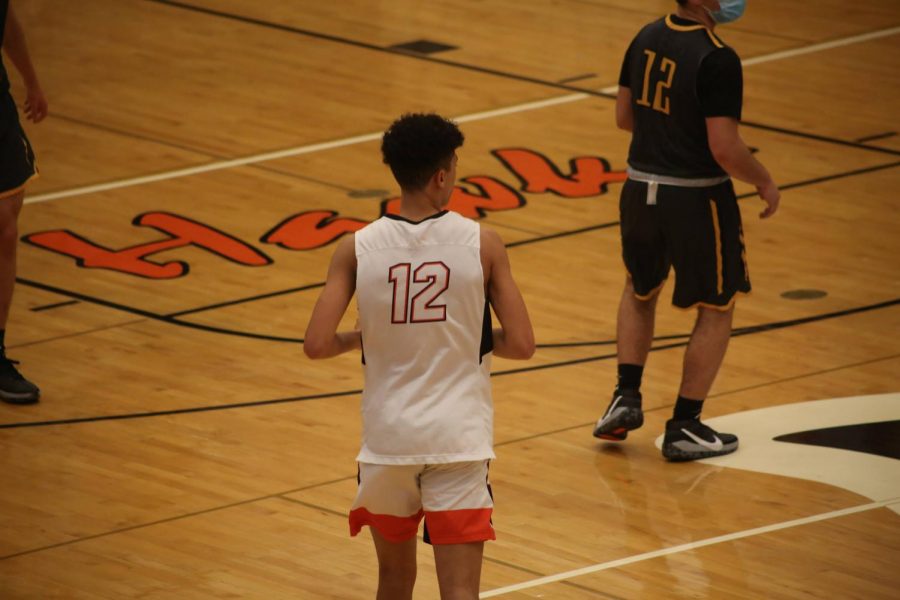 Jaden Goodman proudly wears #12 on the court in honor of his brother who also wore the number.