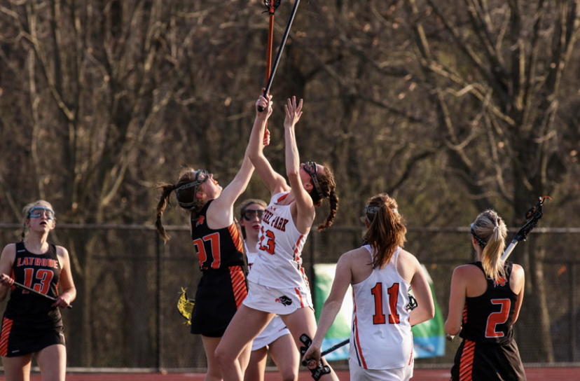 Tori Krapp wins the draw during the girls lacrosse game against Latrobe on April 6, 2021.