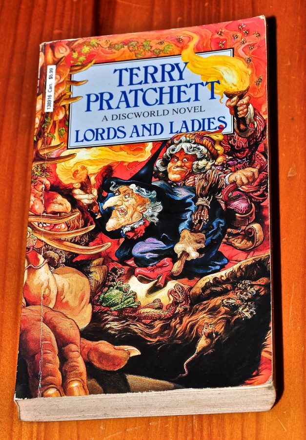 The cover of Lords and Ladies,  a novel by Terry Pratchett.