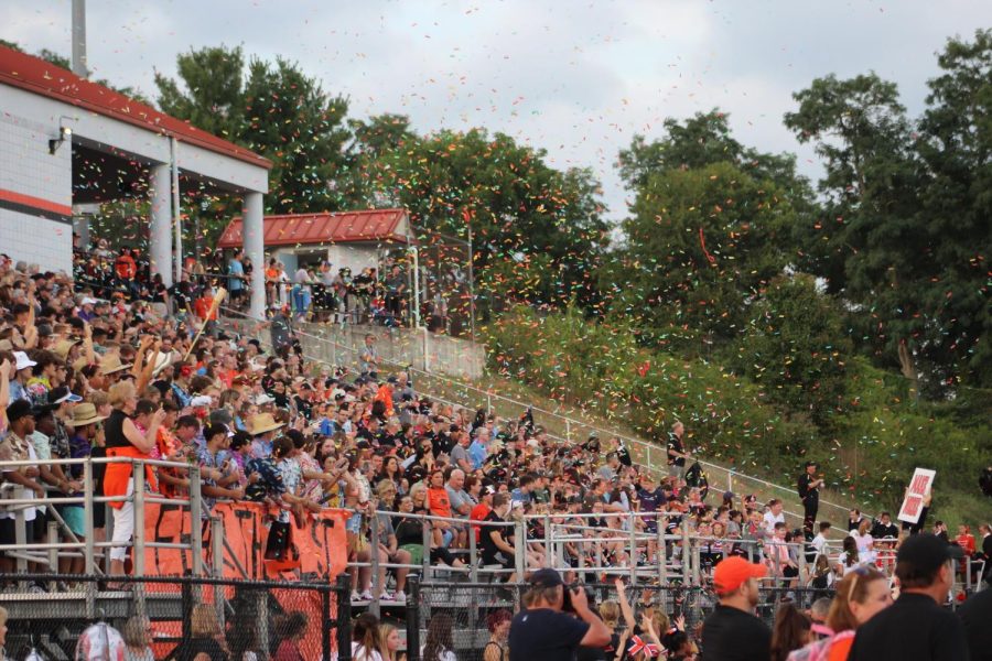 Confetti falls on Bethel Park fans as they cheer on the Hawks in their game vs. North Hills on Friday, Aug. 26.
