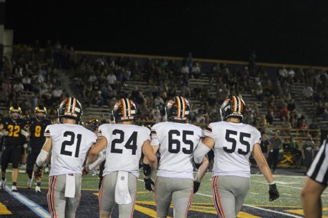 Jack Reilly, Austin Caye, Braedon Del Duca, and Tobias DAndrea held out for the coin toss to start overtime in the Hawks game vs. Lebo on Friday, Sept. 2.