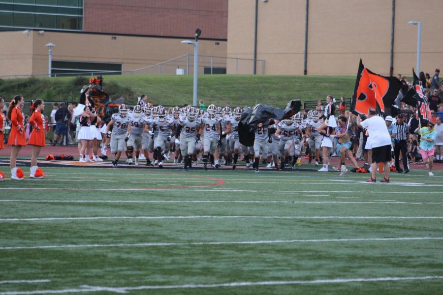 Hawks take the field in their home game against North Hills on Aug. 26.