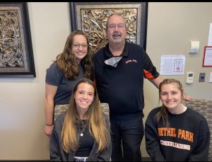 Mr. Knapp poses with some of his former Bethel Park students.