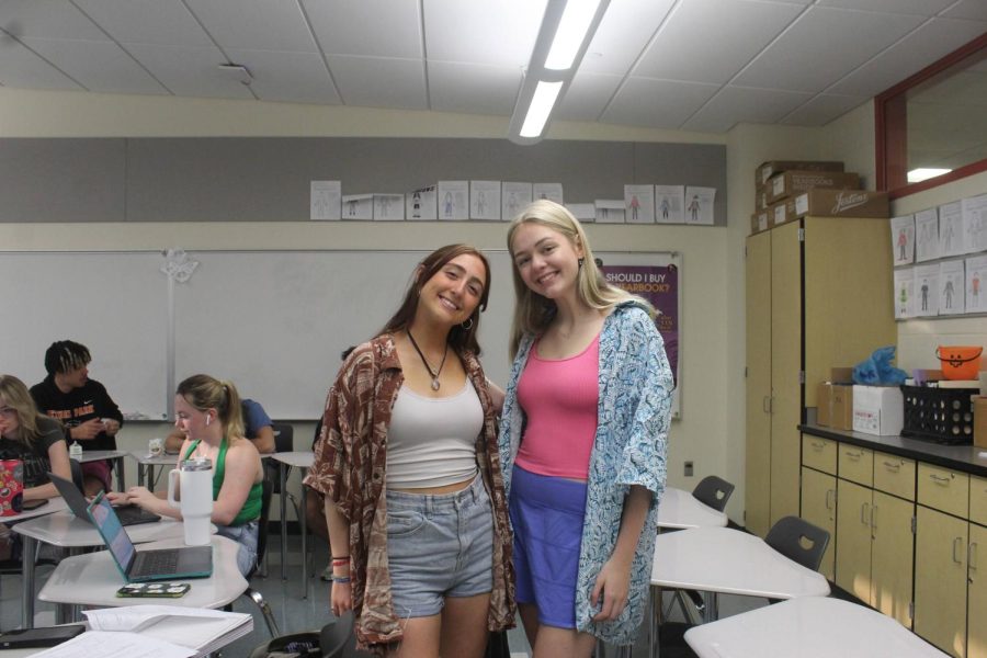 Senior Meghan Krapp and Sydney Edwards participate in Hawaiian Shirt Day on May 24.