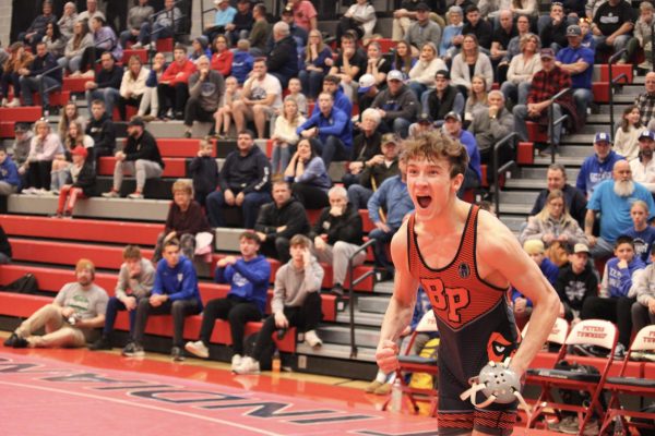 Mason Kernan celebrates after defeating his opponent 1-0 in the 139-pound match in the Hawks semifinal match vs. Trinity on Feb. 2. Mason bumped up a weight class to take on the No. 2-ranked wrestler in the WPIAL at 139 pounds.