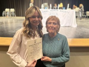 Sophomore Kaelyn Weber poses with her great-grandmother Marian Paff (Class of 1957). Both are members of the National Honor Society.