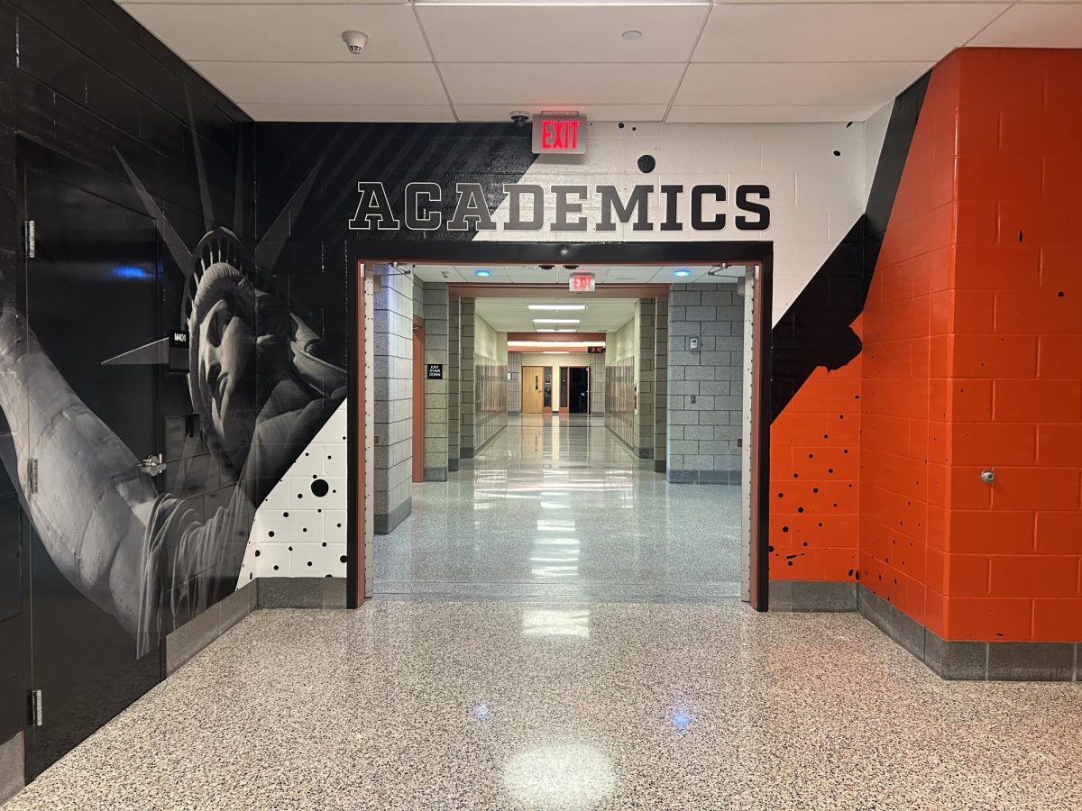 The word "Academics" welcomes students to the Academic Wing of the high school. 