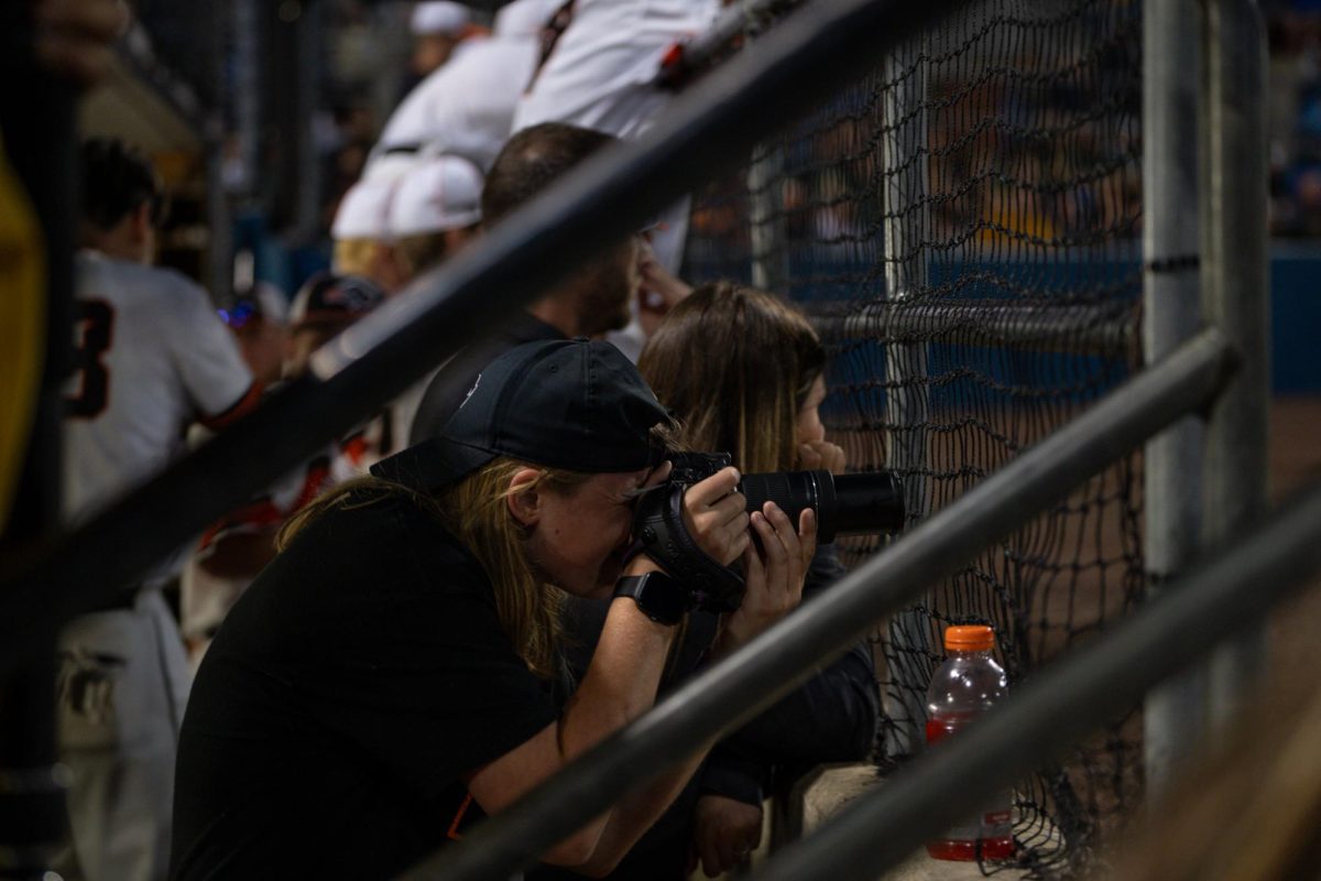 Ally Wolling snaps shots of a Washington Wildthings game.

Photo cred: Joey Bova