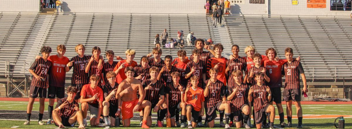 The boys varsity soccer celebrates after defeating Montour on Oct. 19.