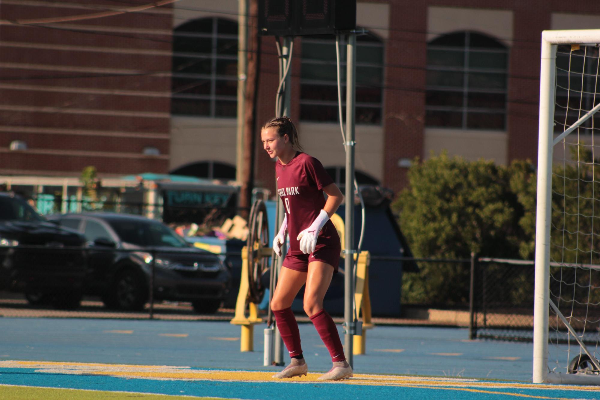 Freya Blatz defends the net in the Lady Hawks' scrimmage vs Canon Mac on Aug. 22.

Photographer: Rose Blatz