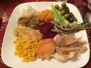 A Thanksgiving dinner plate featuring turkey and other staple foods for the holiday.

Paulo O, CC BY 2.0 , via Wikimedia Commons