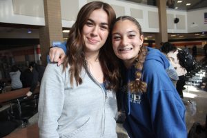 Romane Crepieux and Miriam Anderson wear blue in recognition of Childhood Grief Awareness Day on Nov. 16, 2023.