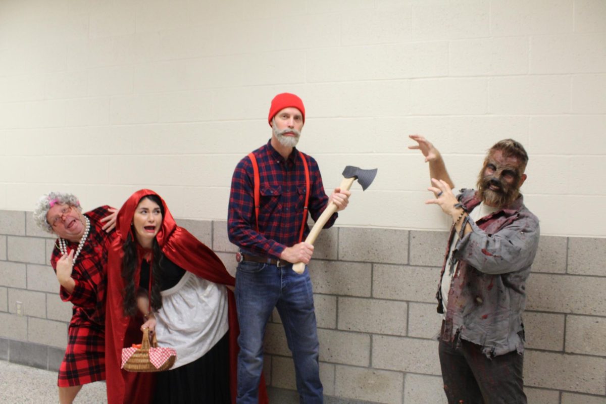 What big TEETH you have! The Art and Tech Ed Departments dressed up as characters from the beloved fairy tale "Little Red Riding Hood."