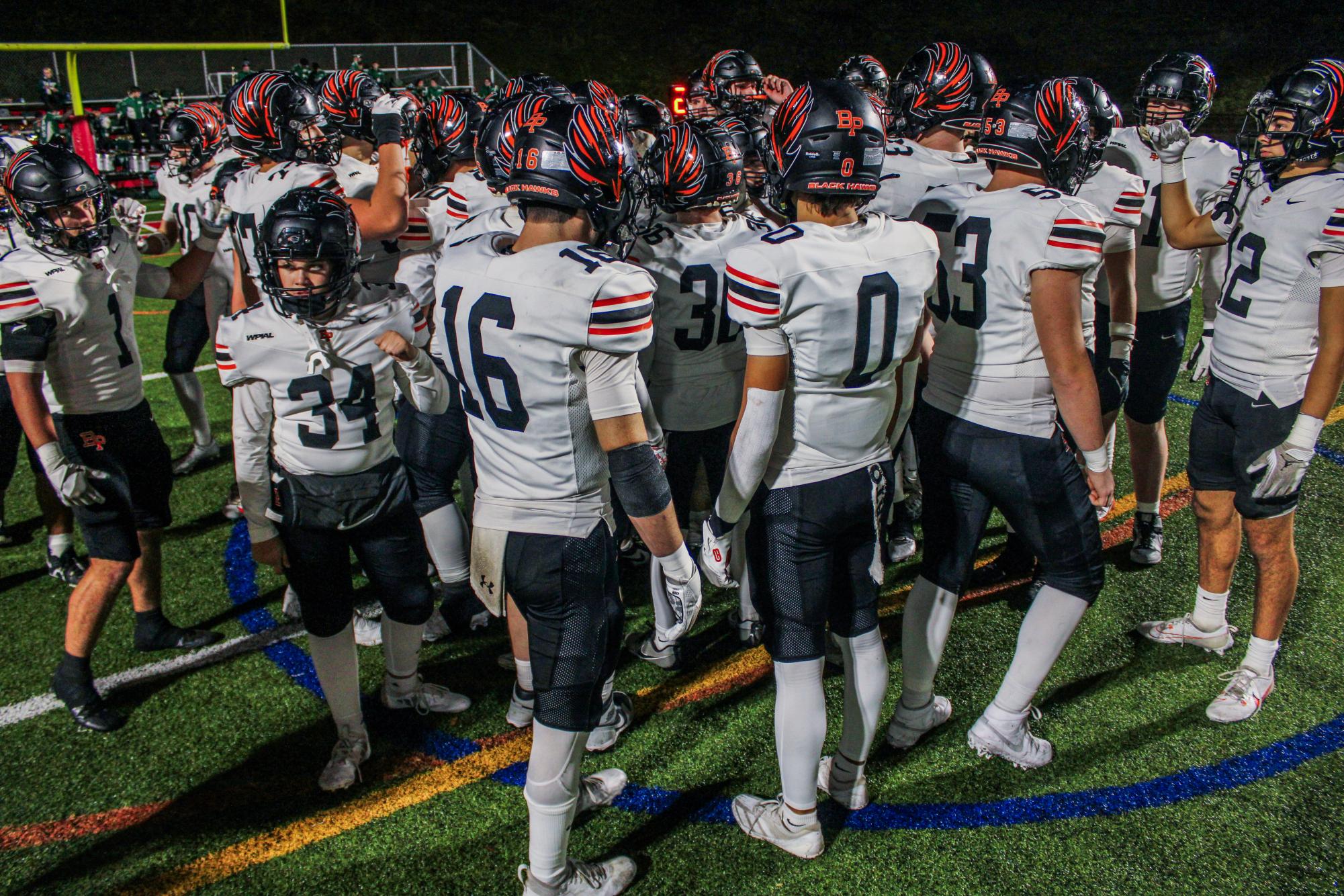 Bethel Park Footballs huddles up before taking on the second half during their game against Pine Richland on Friday, Nov. 15.