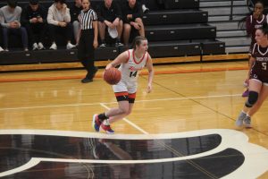 Sadie Orie drives to the basket in the girls basketball game vs. Uniontown on Senior Night, Dec. 19.