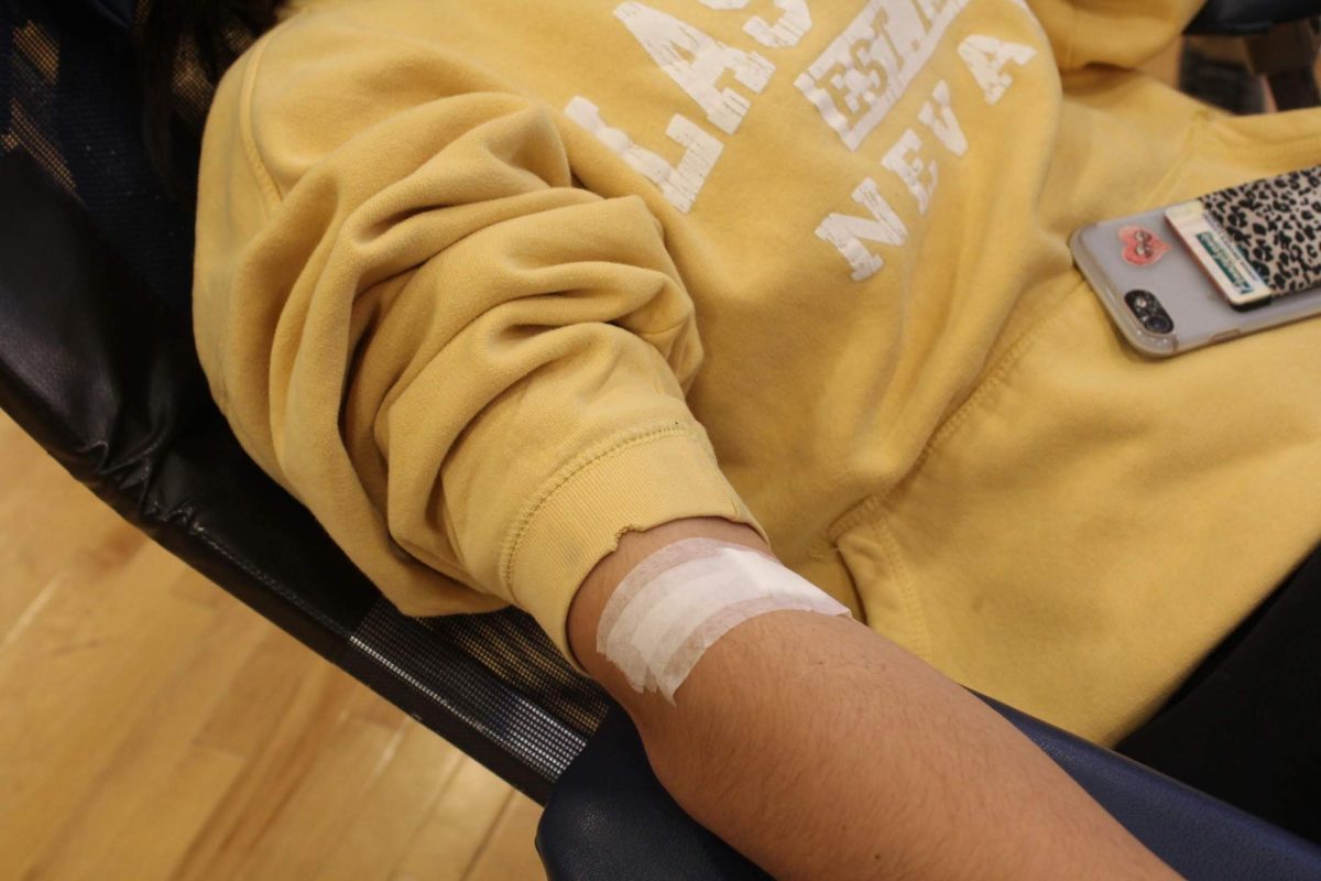 A student rests after giving blood at blood drive on Jan. 15, 2020.