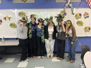 French students don various masks in celebration of Mardi Gras.