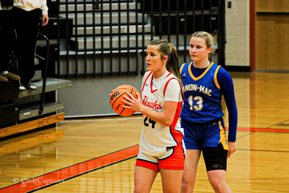 Addy Owen about to score a point in a intense game against Canon Mac.