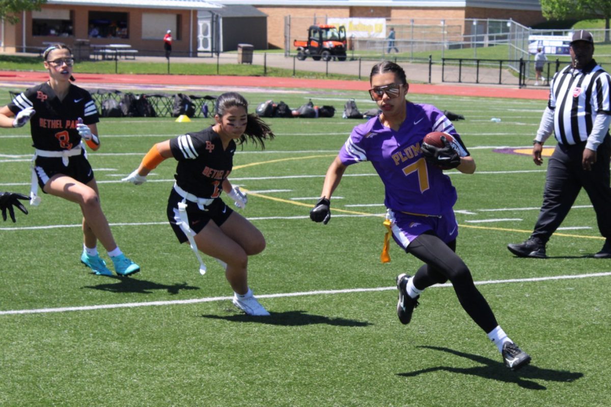 Daphne Mach looks to tackle her opponent in a game against Plum during the 2025 season.