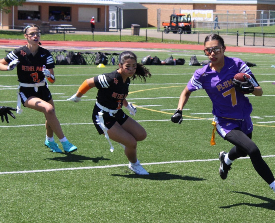 Daphne Mach looks to tackle her opponent in a game against Plum during the 2025 season.