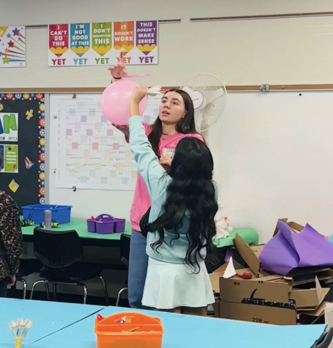 Grace Perdziola mentors young girls interested in futures in engineering.
